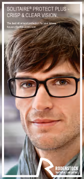 A man wearing glasses and a scarf