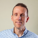 Man with blue shirt Roland van der Put