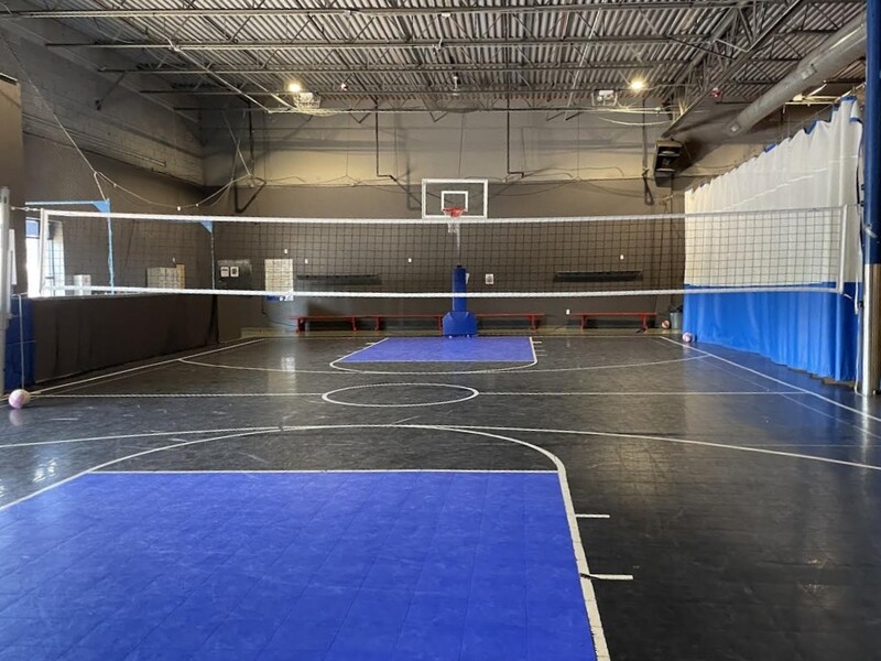 CO-ED Pickup Volleyball In Game On Sports Center, Taylor