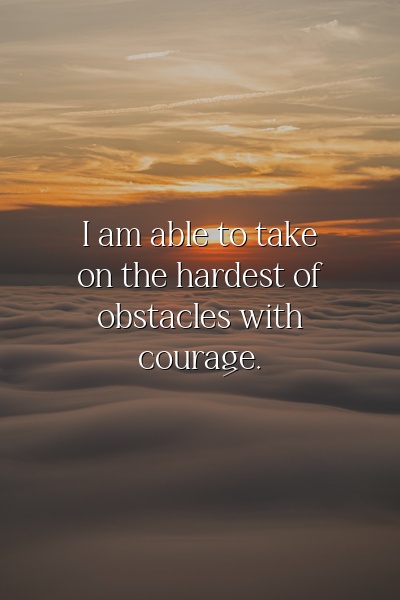 Affirmation about courage to overcome obstacles on a sunrise background