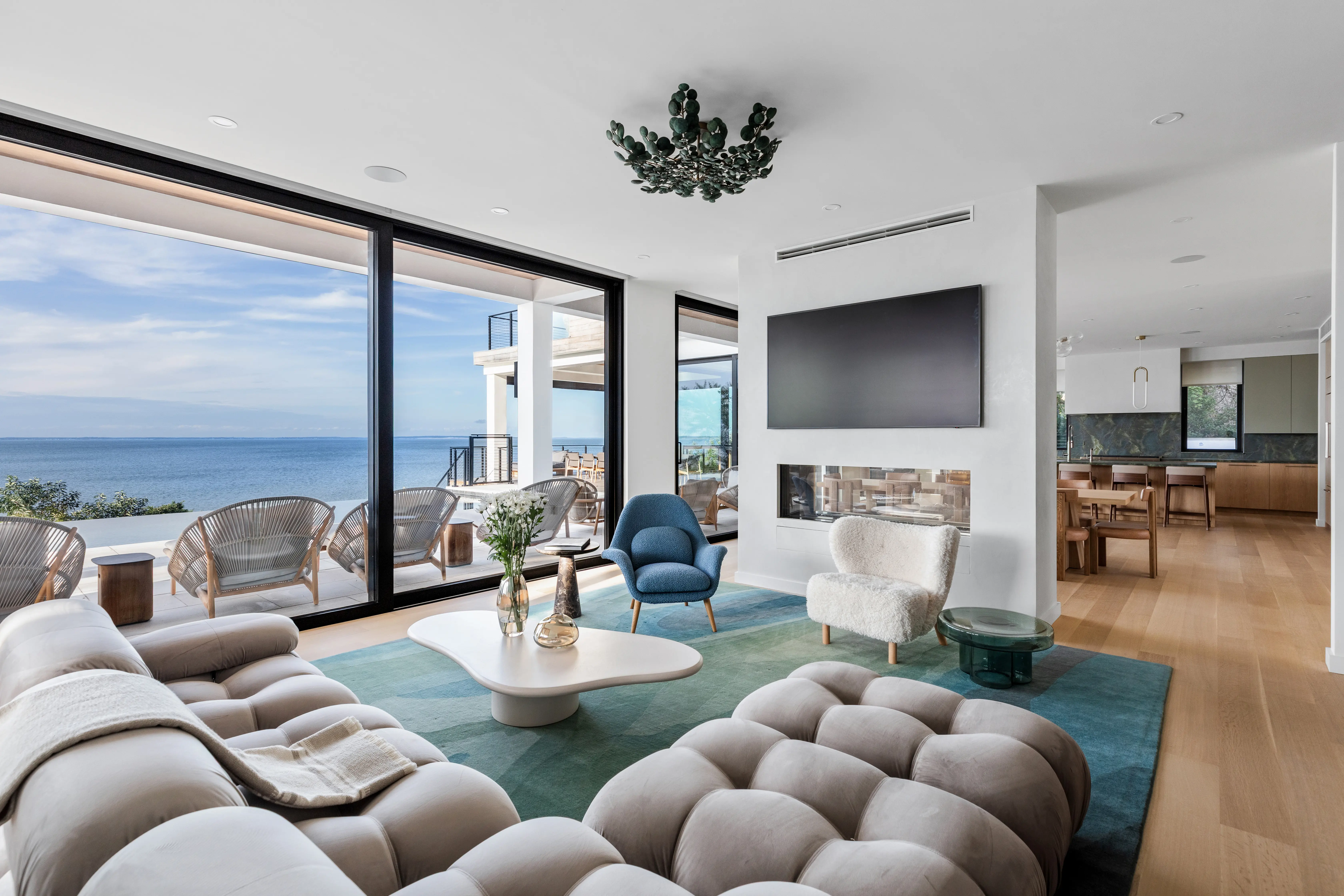 Luxury residential interior with panoramic waterfront views