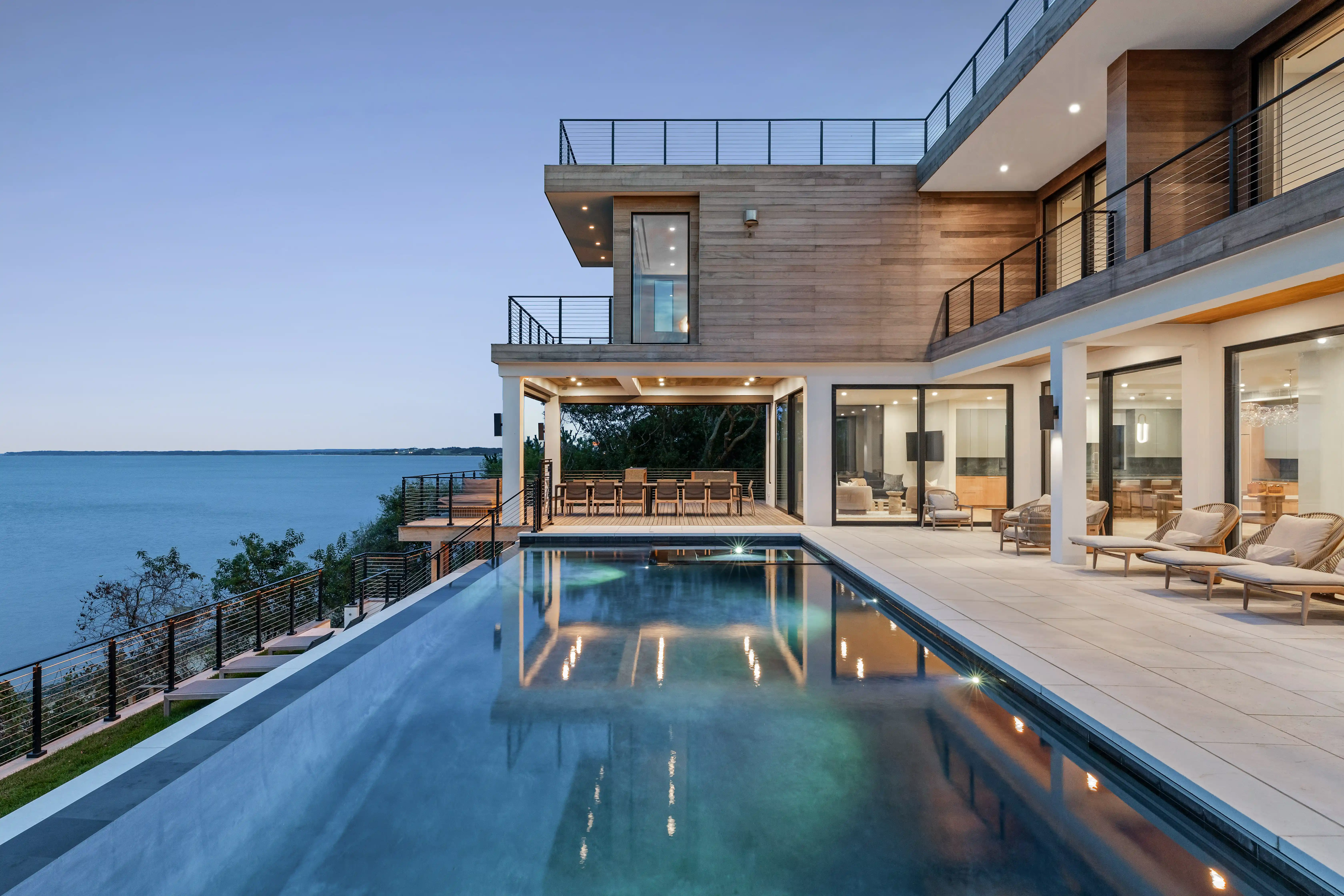 Modern waterfront residence with luxury poolside outdoor space