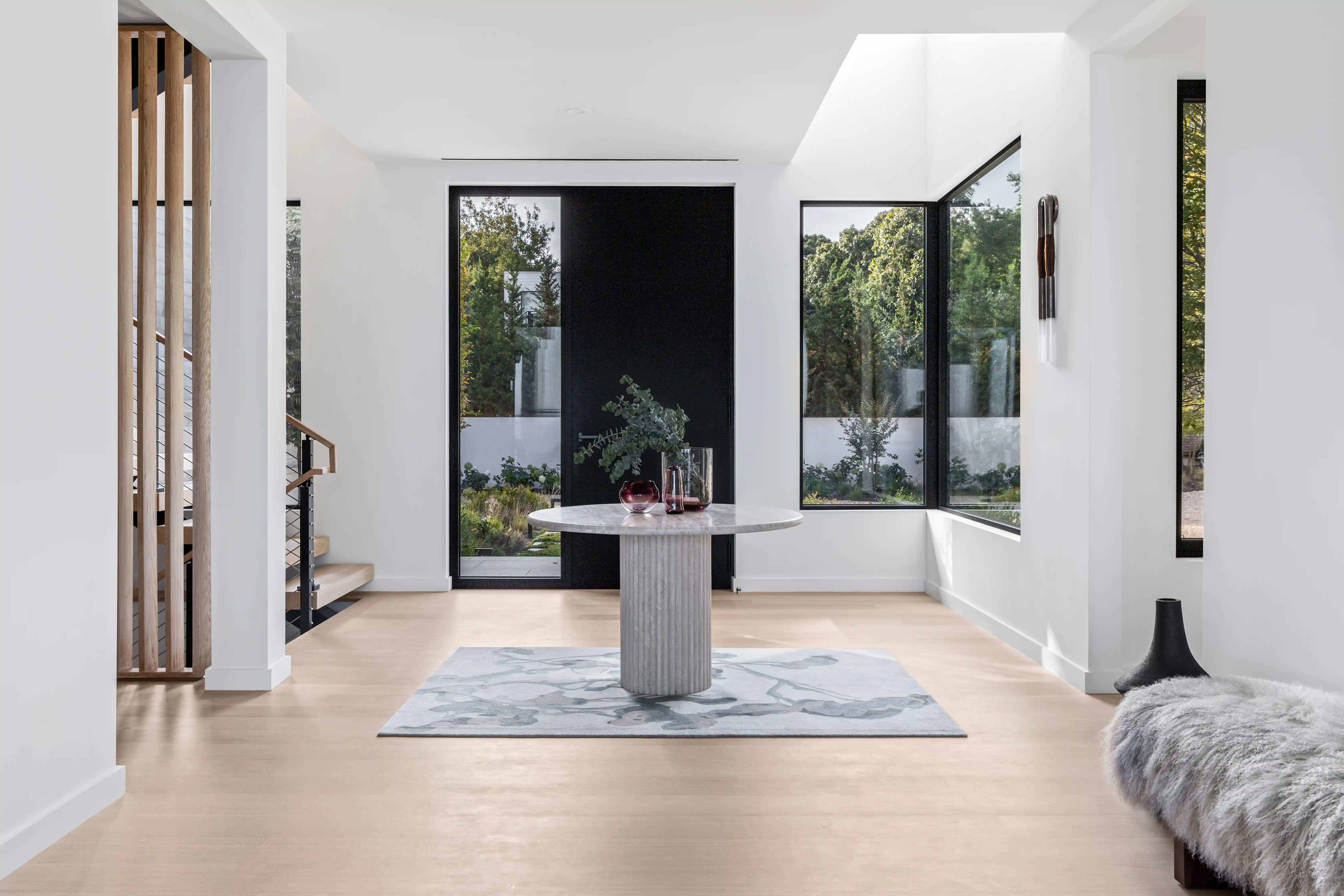 Luxury residential interior featuring modern entry hall and open layout