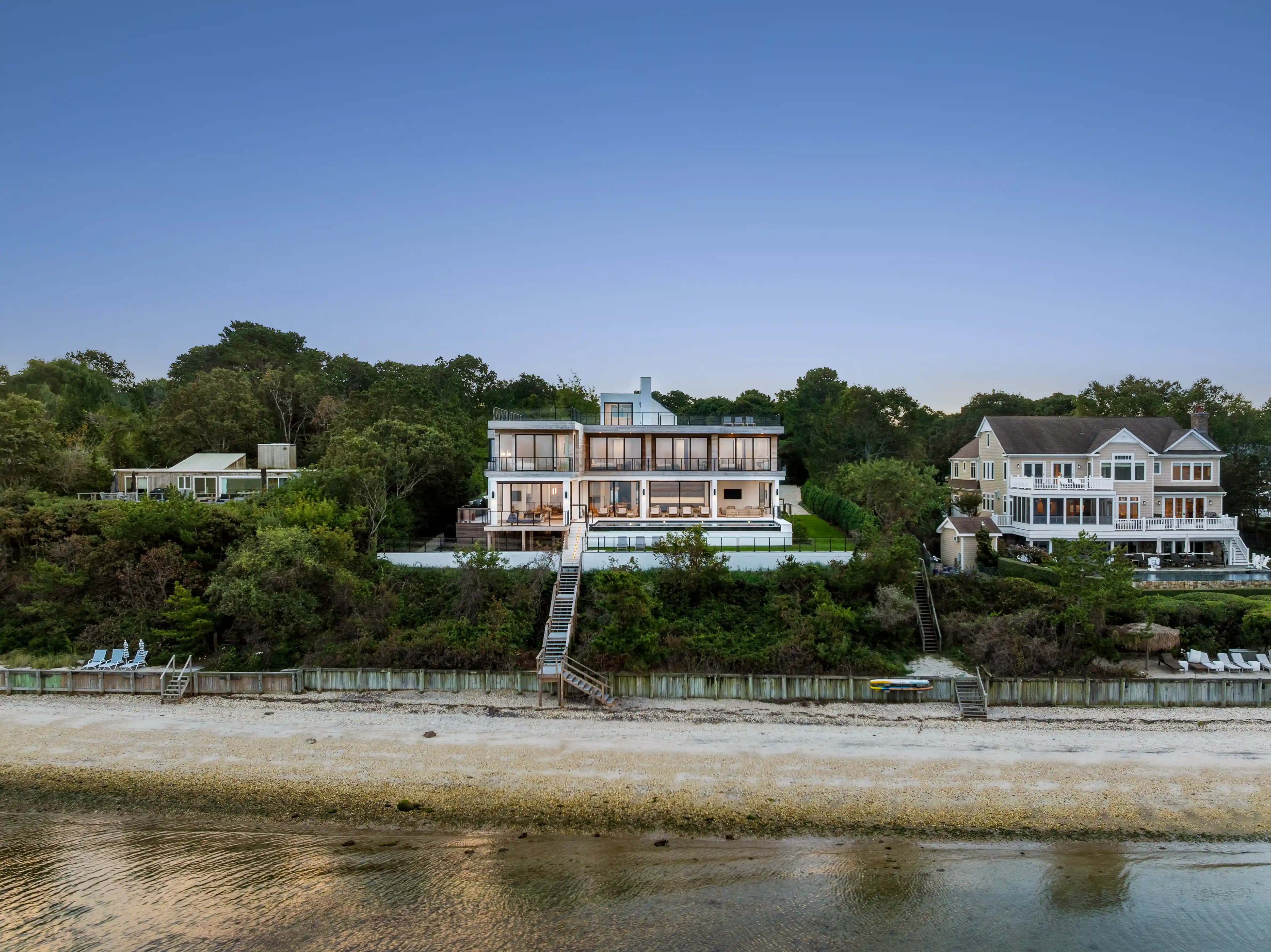 Luxury waterfront custom home with ocean views and modern outdoor living spaces