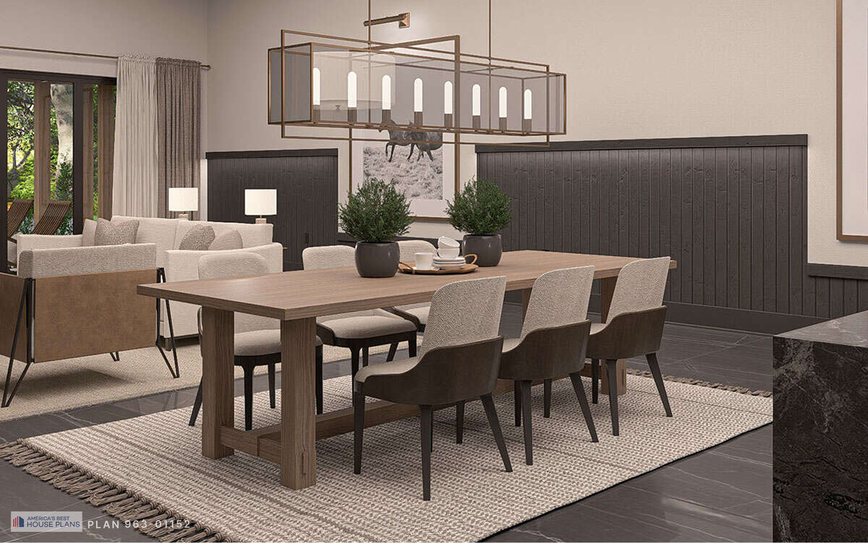 Modern barn-style dining room with wood table, upholstered chairs, statement chandelier, and open-concept layout