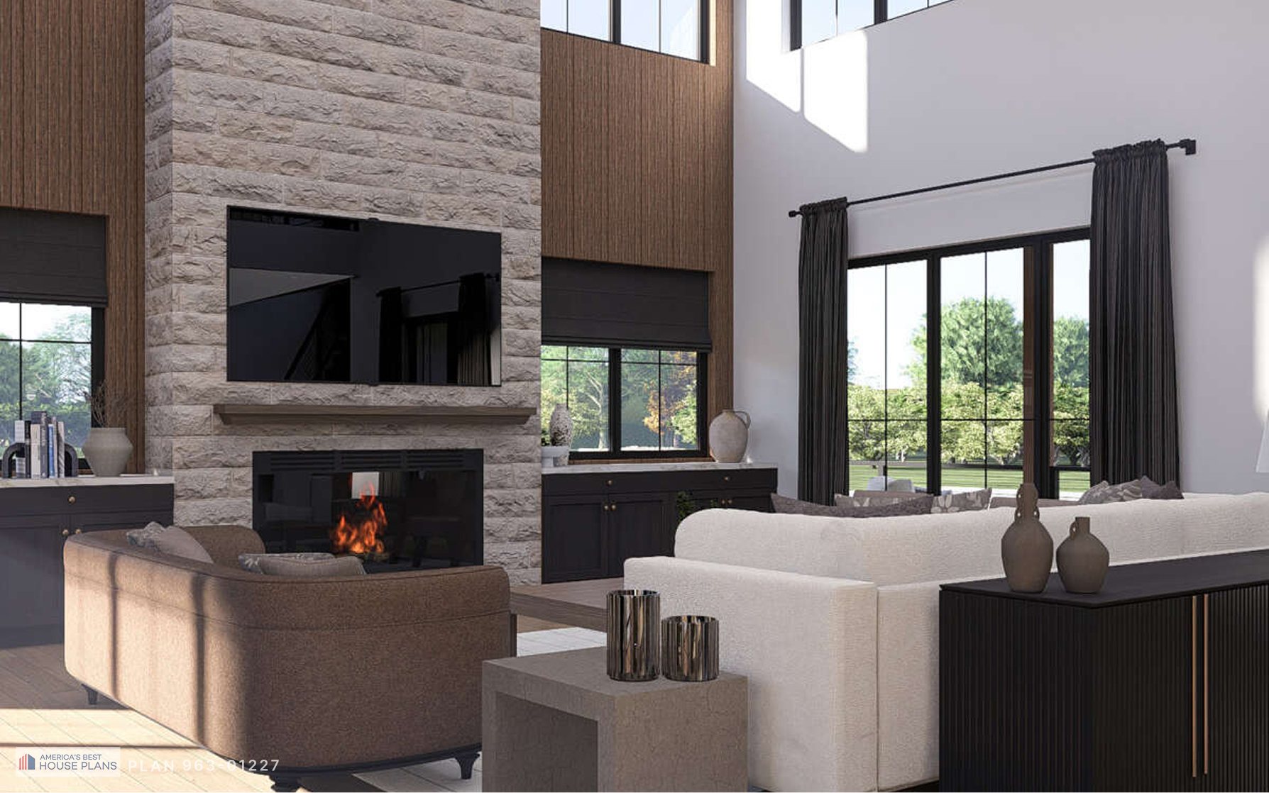 Barndominium great room with floor-to-ceiling stone fireplace, large windows, and modern seating