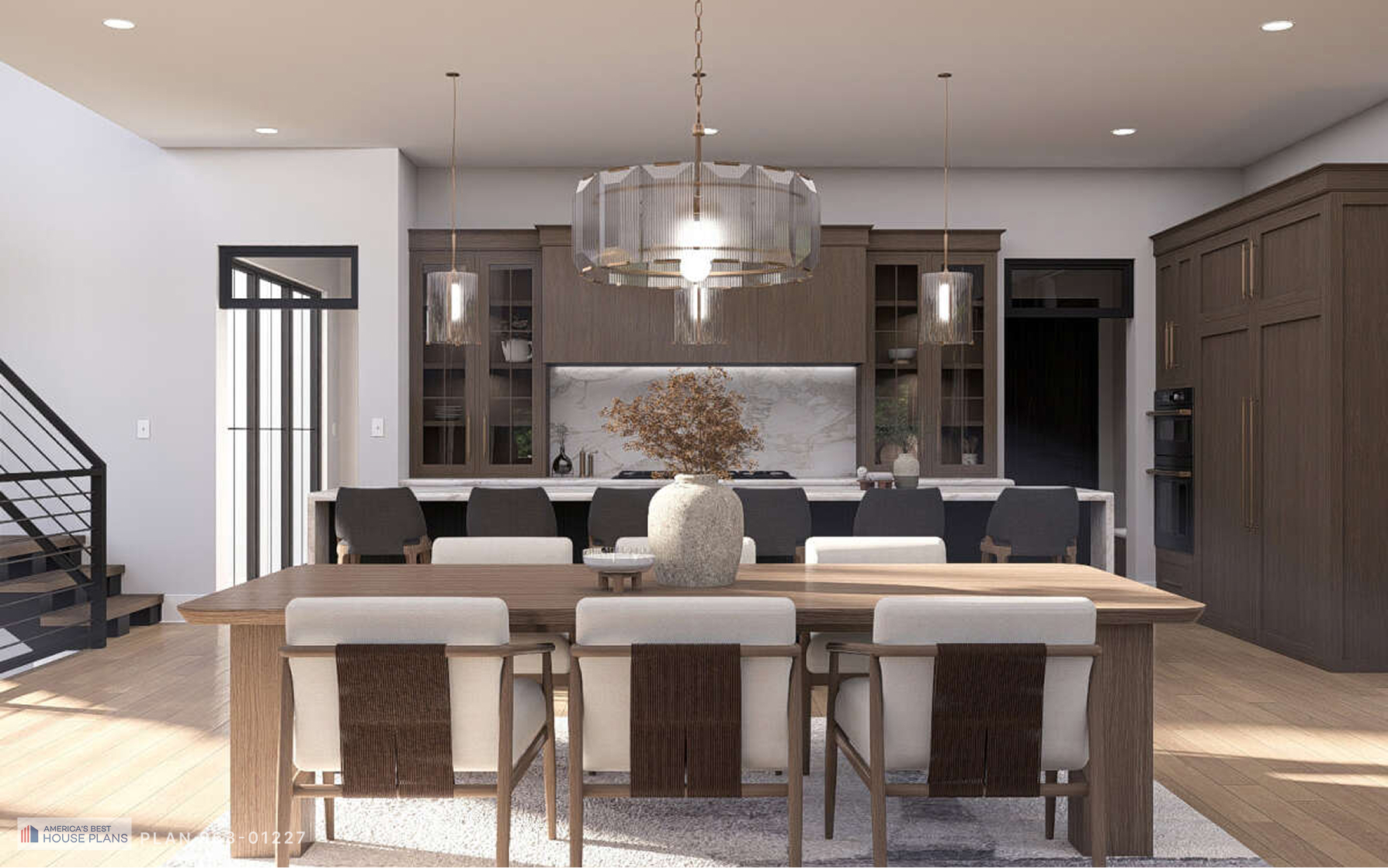 Open-concept kitchen and dining area with oversized island, custom cabinetry, and contemporary lighting
