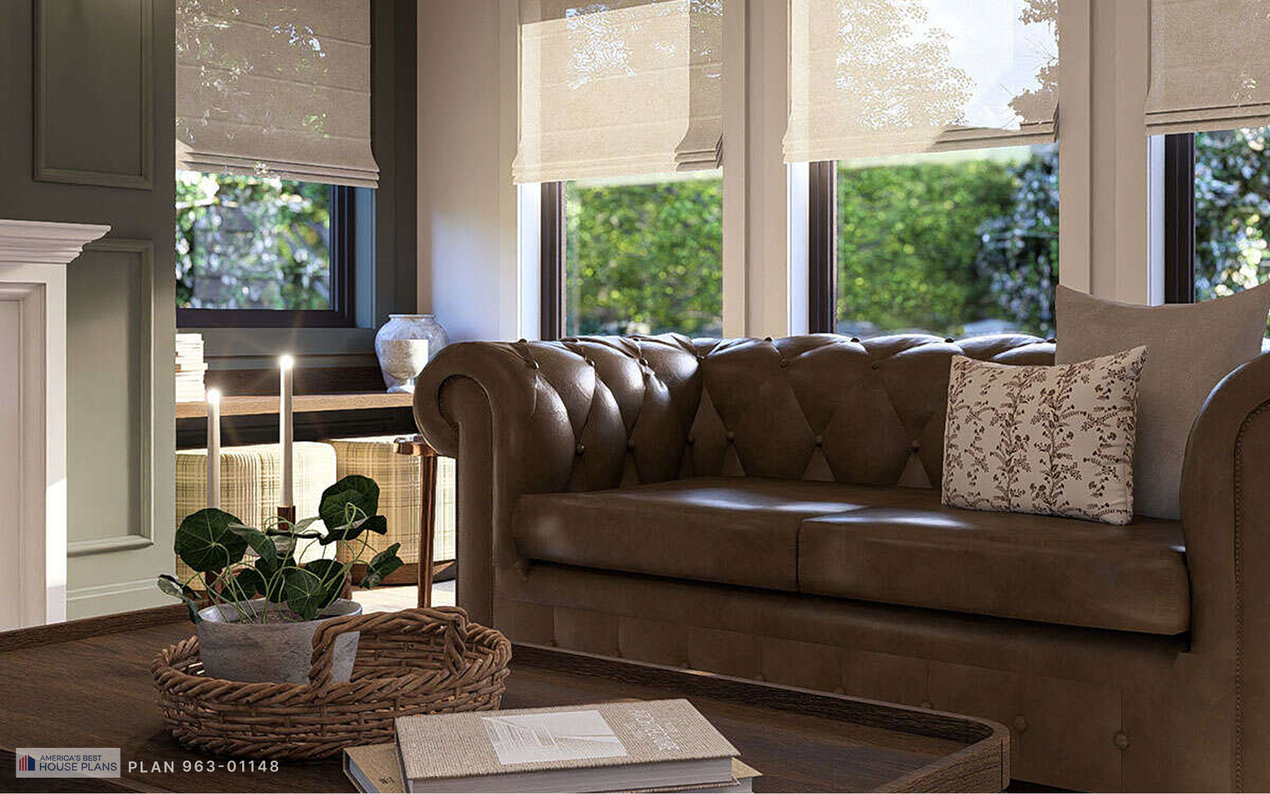 Cozy seating area in a Cape Cod home with tufted leather sofa, large windows, and fireplace
