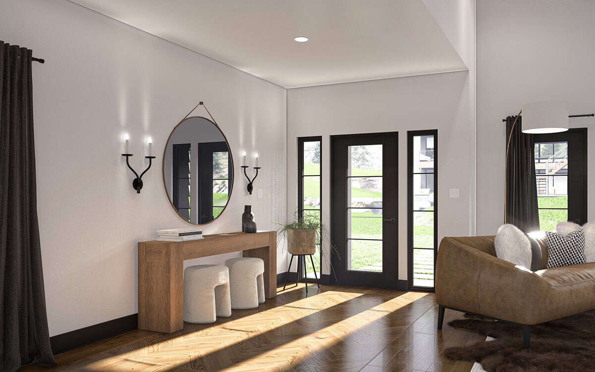 Modern open-concept foyer with hardwood flooring