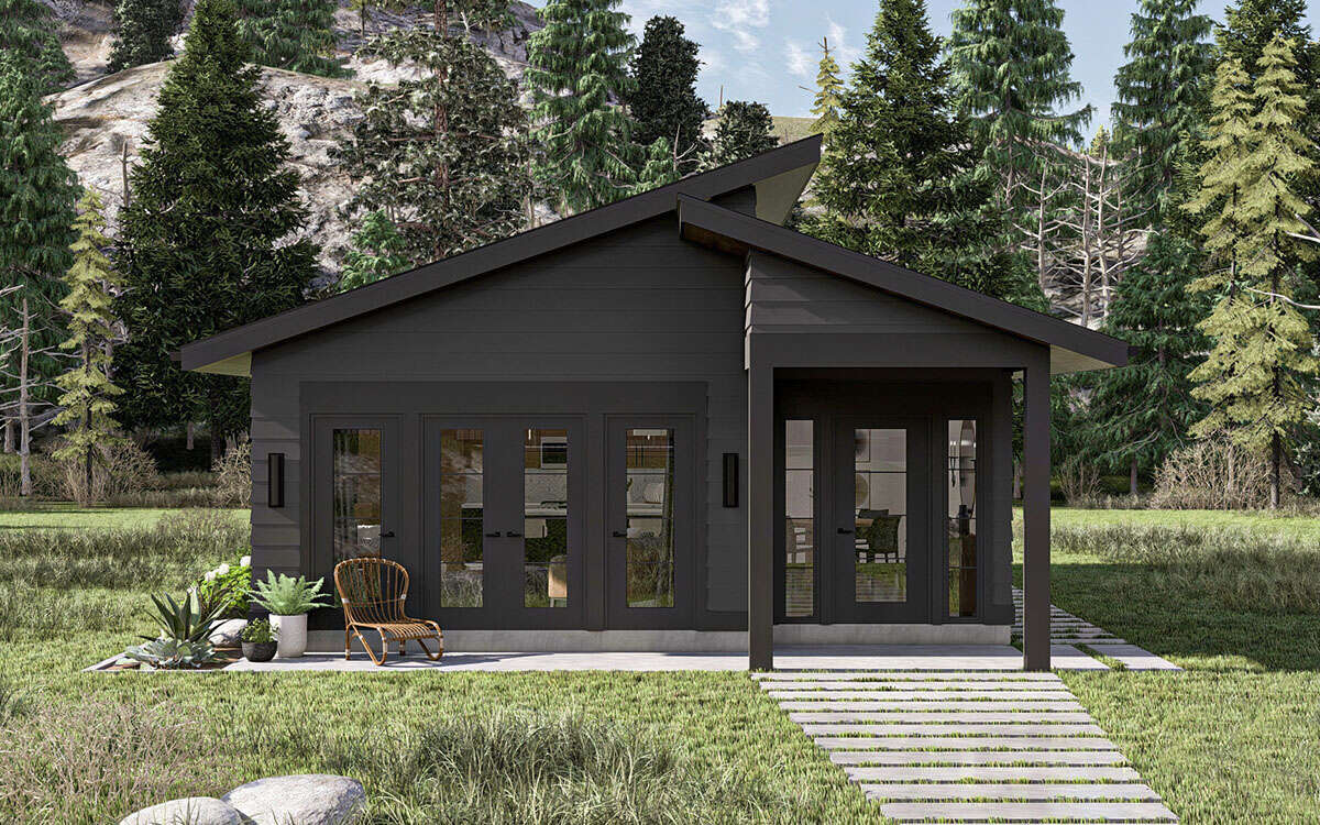 Contemporary single-story home with angular roofline, dark exterior finish, covered entry porch, and sleek modern design