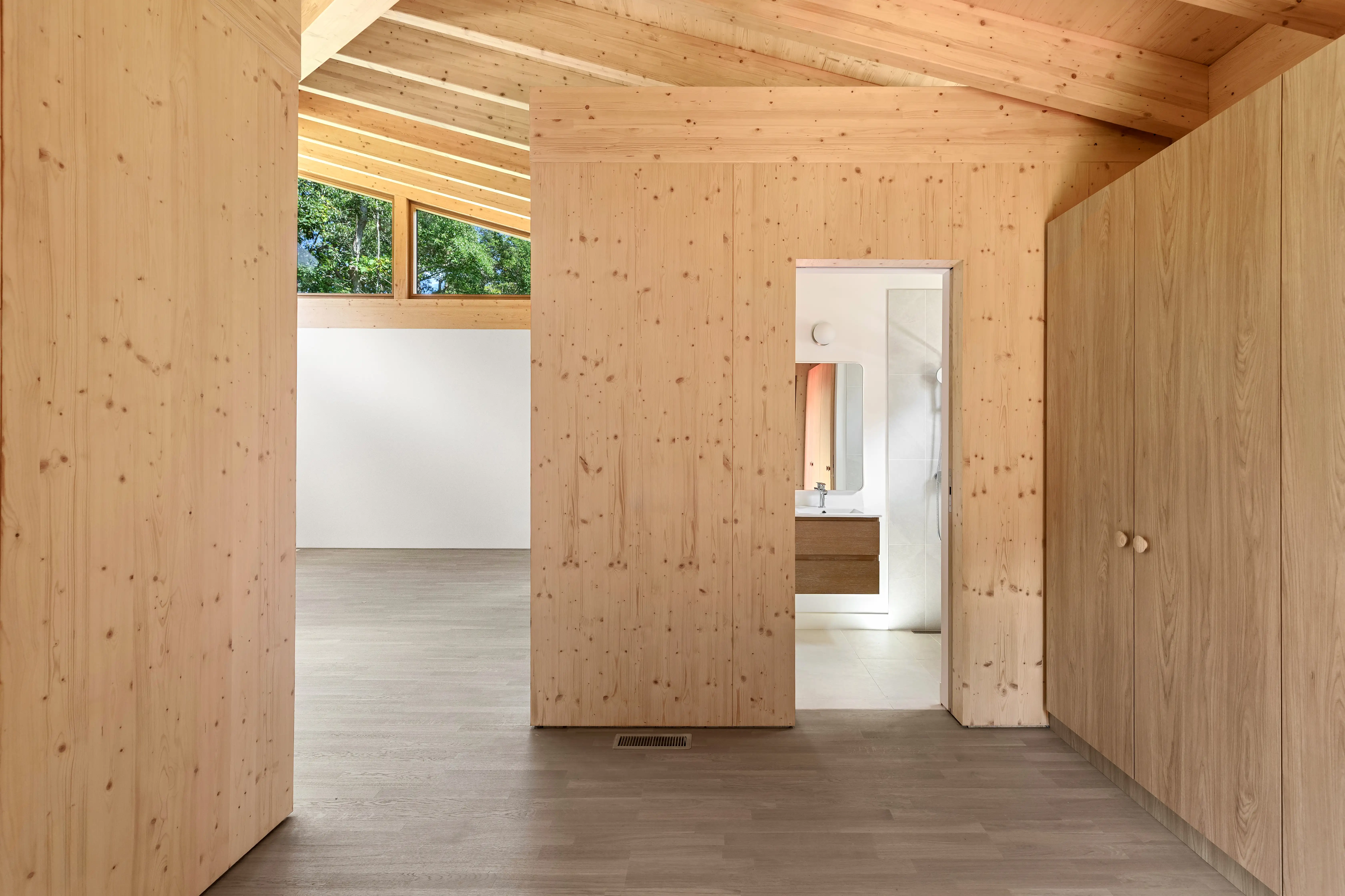 Warm timber-lined interior at Ma’s House