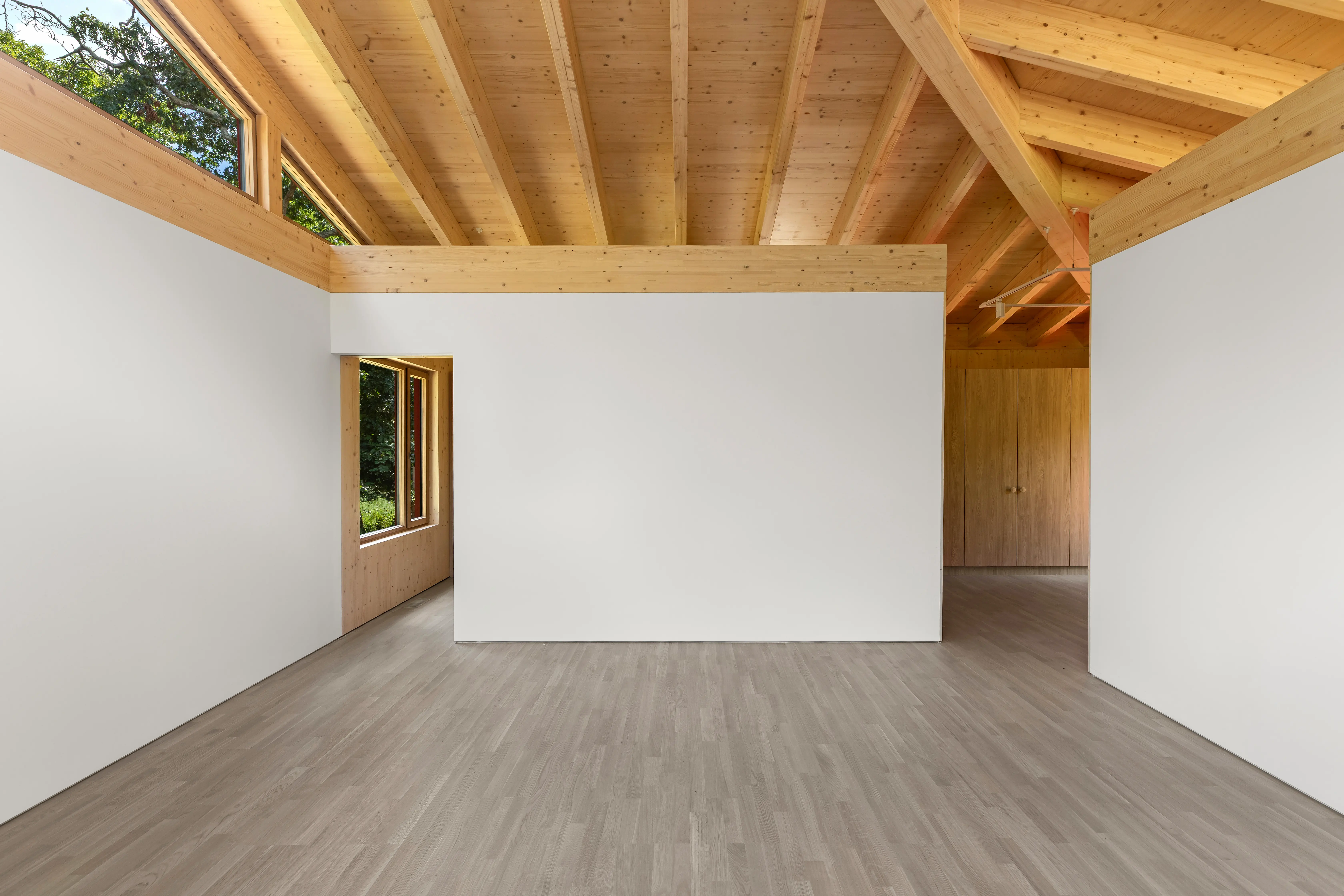 Ma’s House gallery interior with exposed timber ceiling