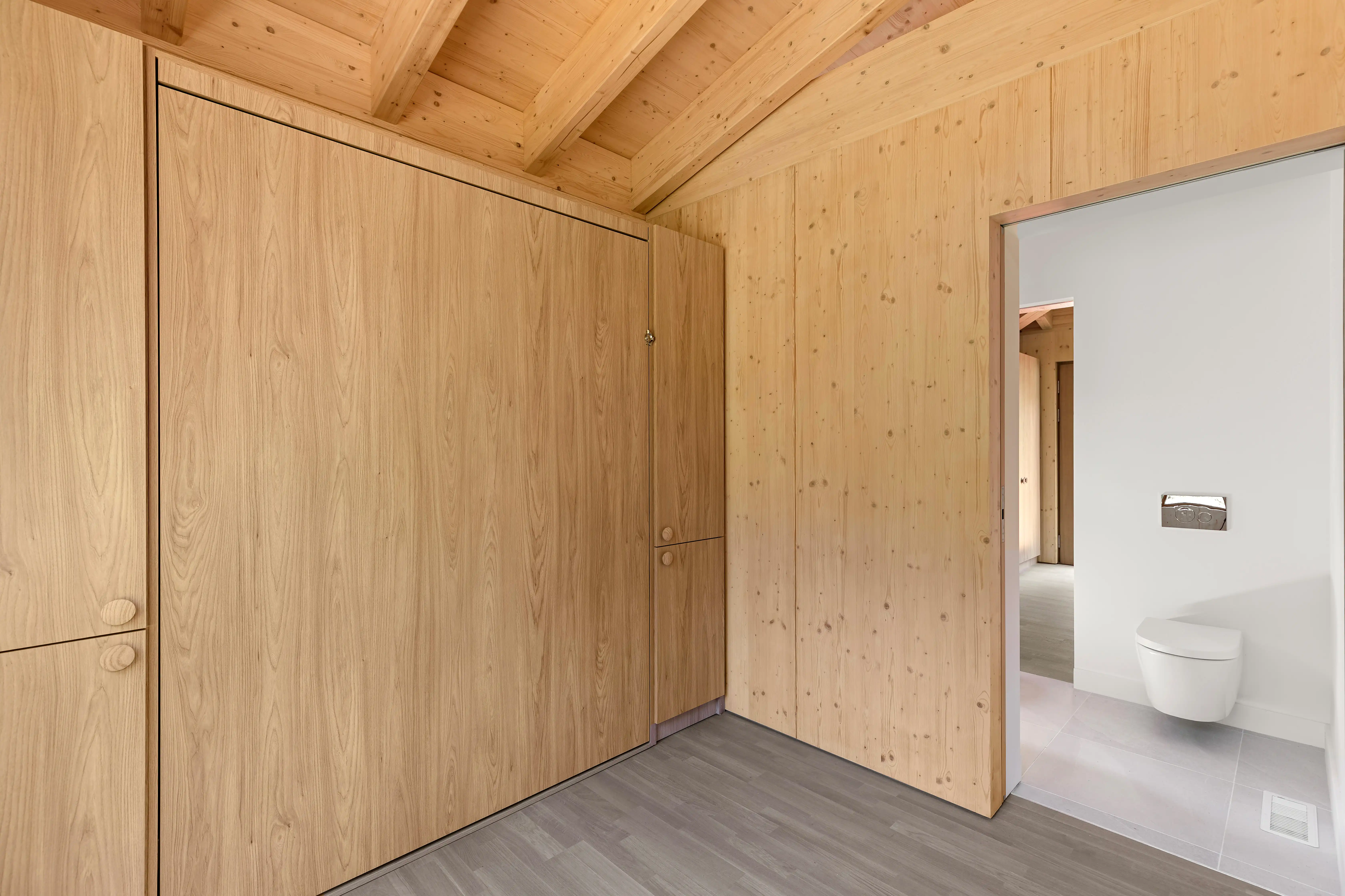 Ma’s House timber interior with built-in wood storage