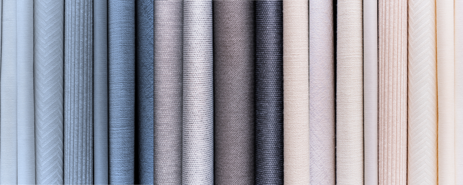 A gradient of fabrics from blue to beige.