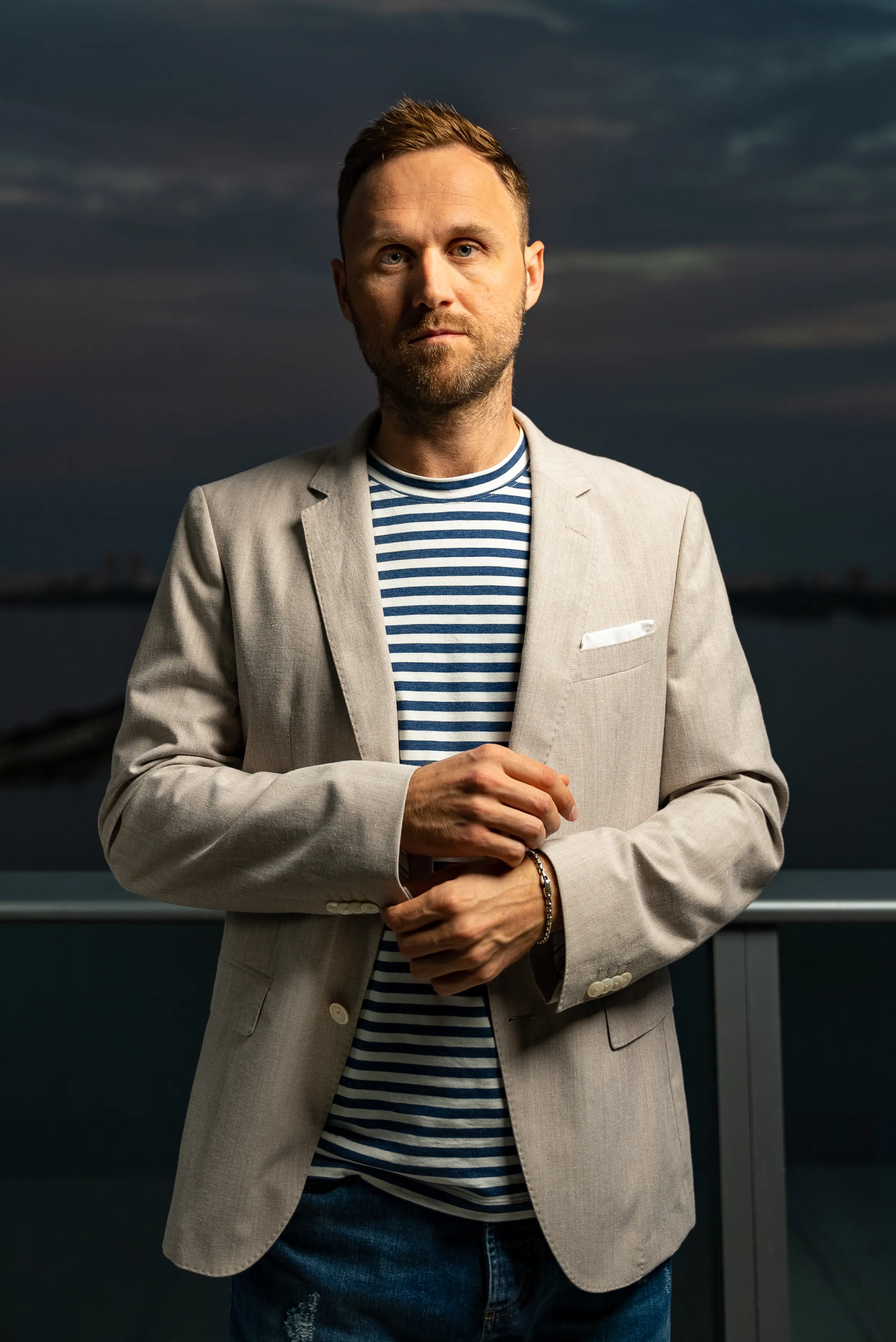 Personal brand portrait of a man in a blazer at sunset, shot by RGA