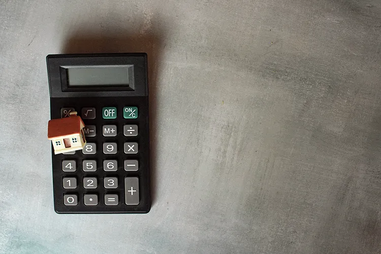 Taschenrechner mit Haus