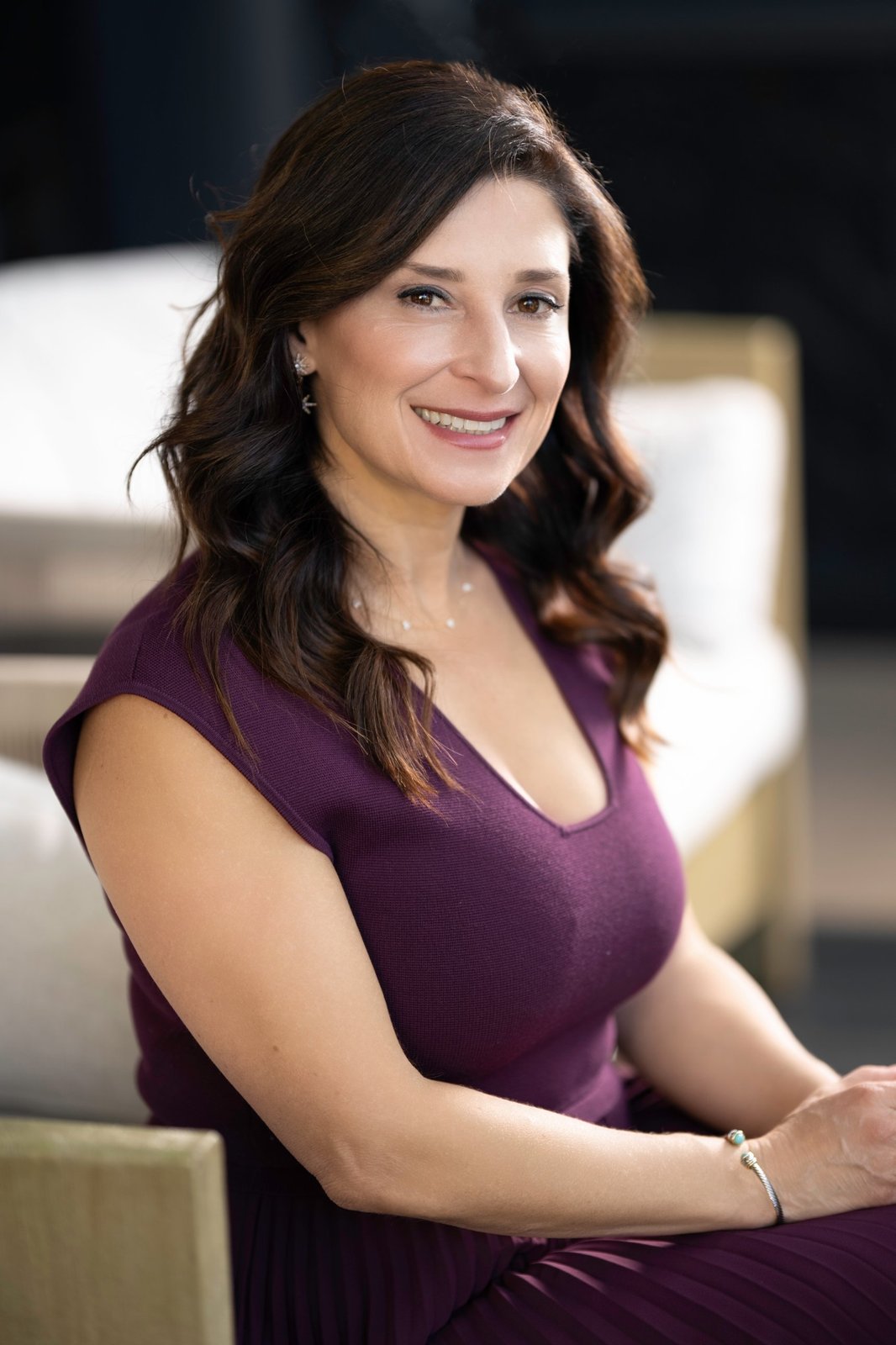 Ann Parnes of afterhello in a purple dress Matchamker 