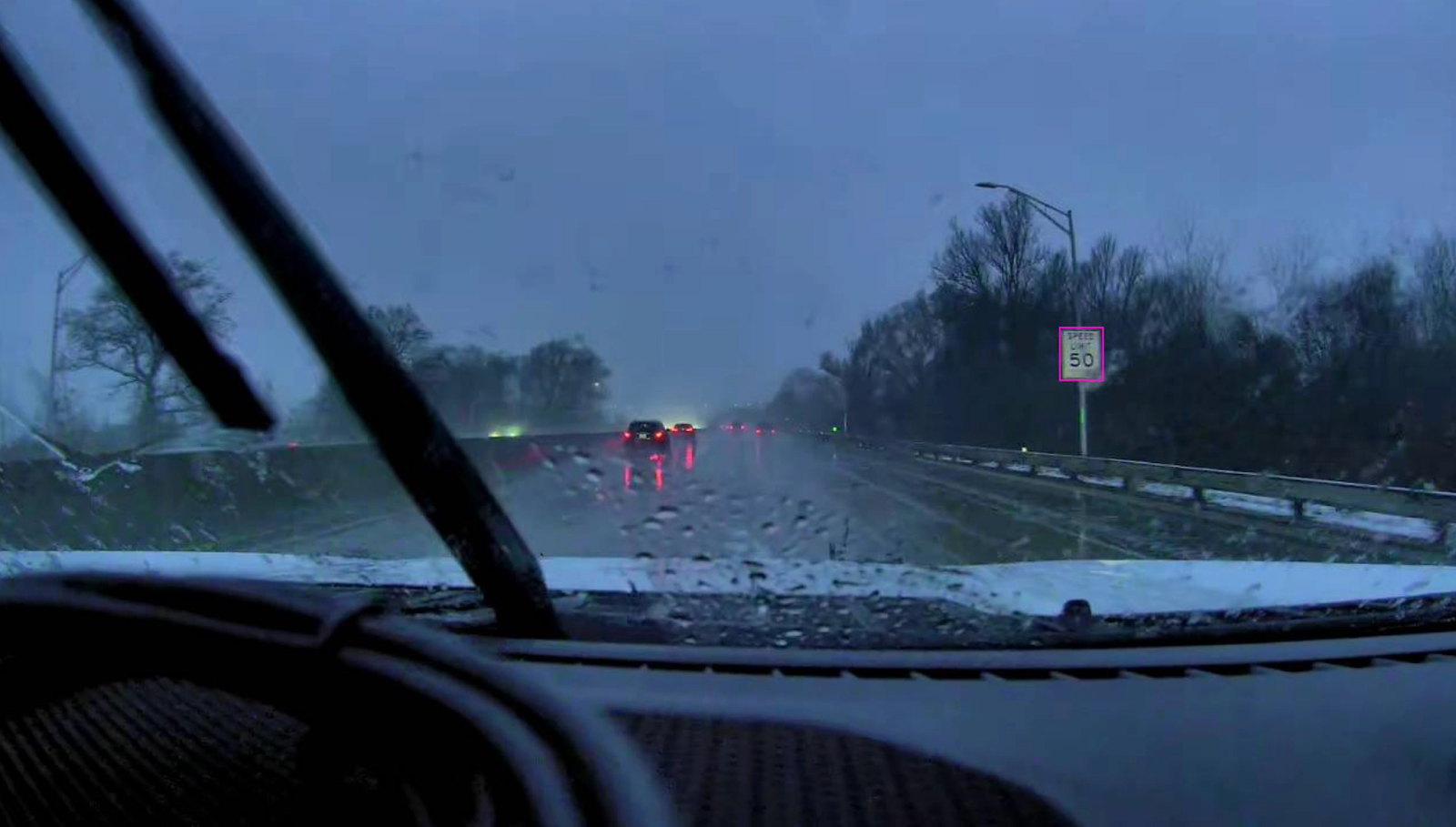 Speed limit sign detected in rain conditions in NYC streets