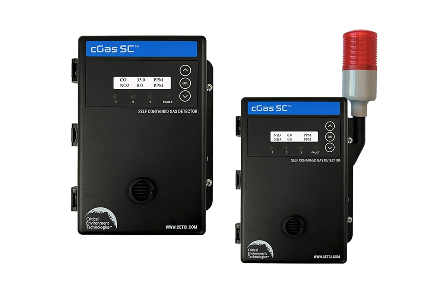 Two black industrial gas detection units, the "xChange MC", with blue accents and digital displays. The unit on the right features an additional red warning light attached to its top, indicating its readiness for gas monitoring and safety applications.