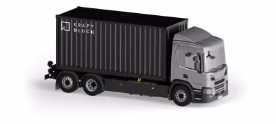 Truck carrying a Kraftblock mobile heat storage container. The container is a multifunctional energy storage system for heat and power, allowing the transport and availability of green, net-zero heat helping replace fossil fuels to consumers that are far away.