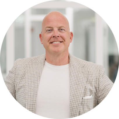 Professional portrait of a person representing Pacemaker.ai's expertise in AI-driven demand forecasting and procurement solutions.
