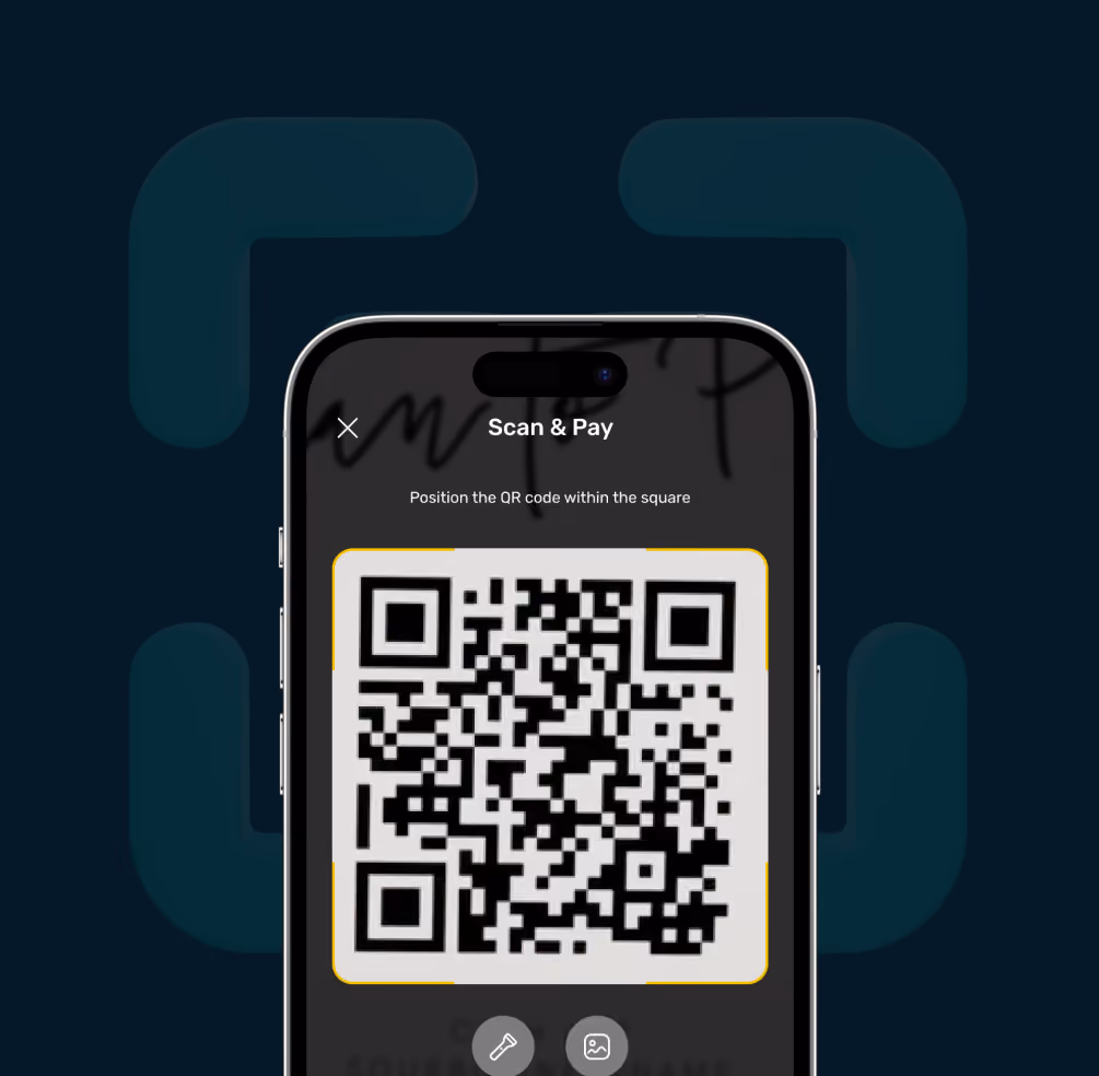 Smartphone screen showing a QR code scanner with instructions to position the code within the square.