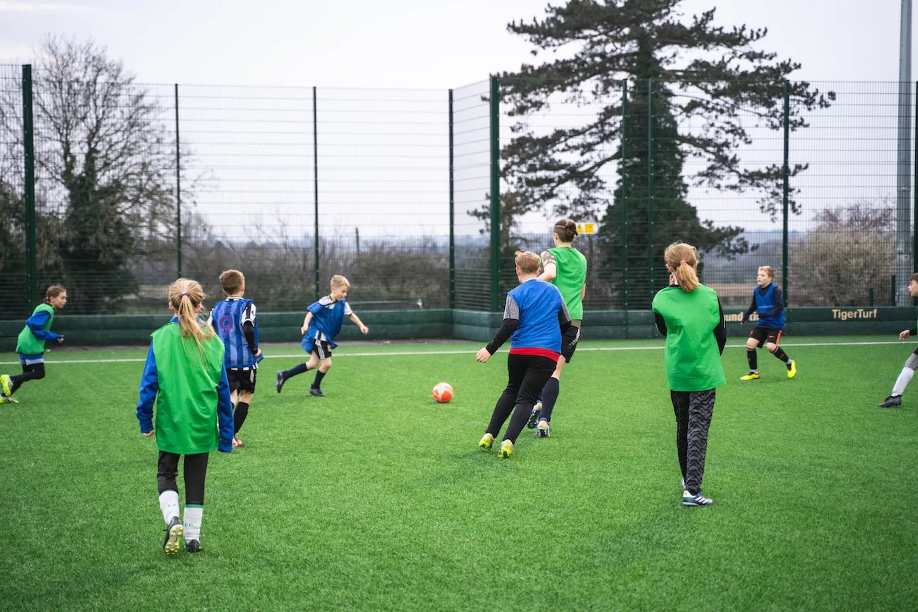 Kids playing football at a birthday party! 