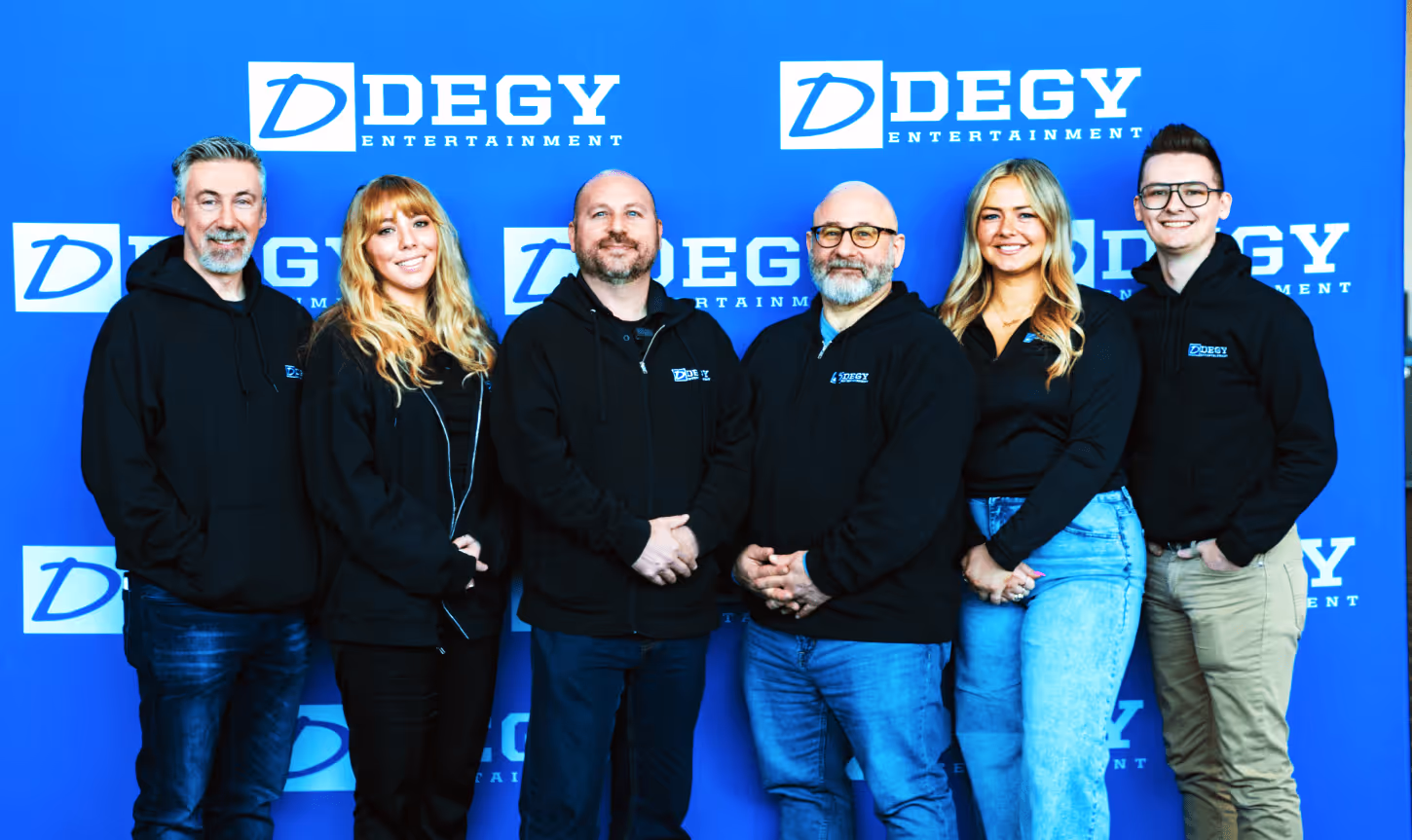 Degy team meeting at a conference