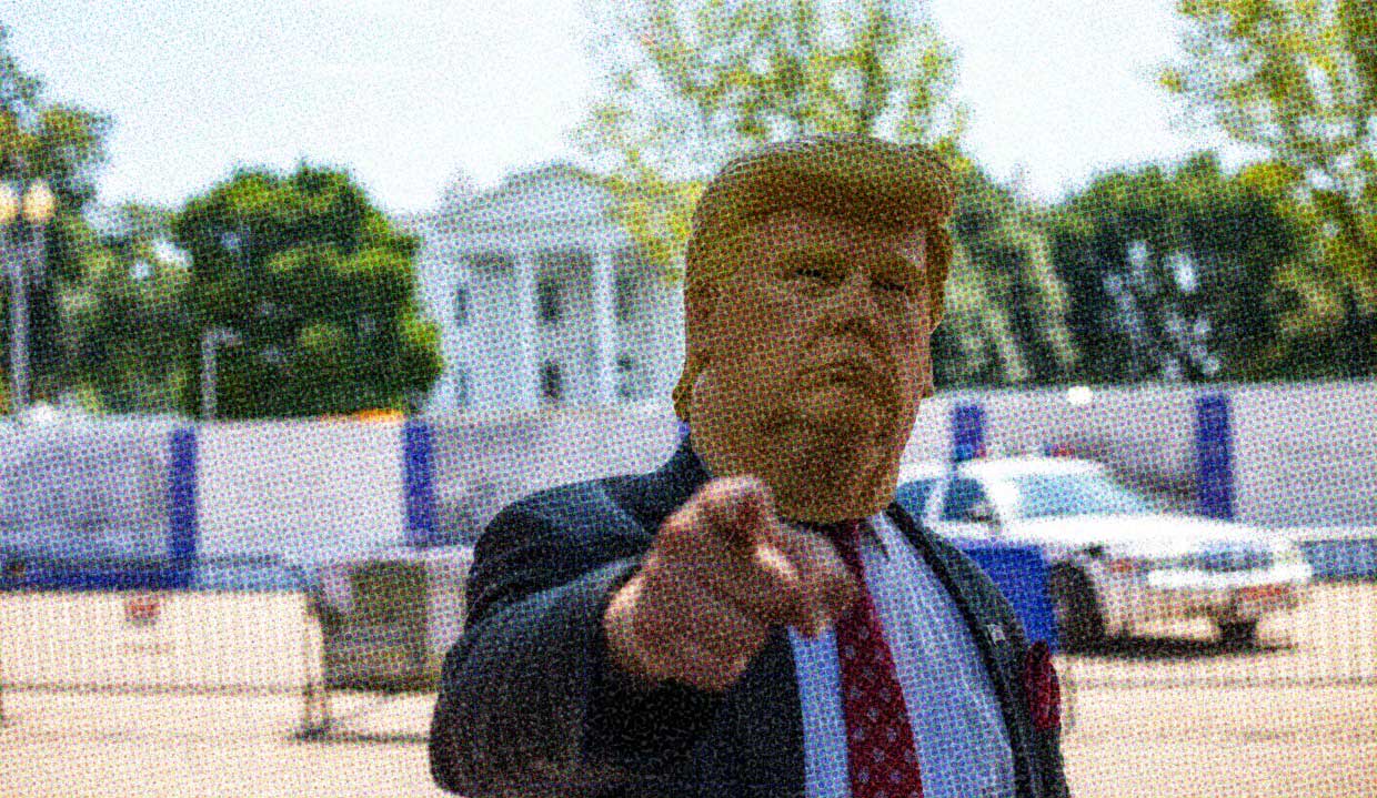 A person in a Trump mask stands outside of the White House, pointing a finger at the viewer.