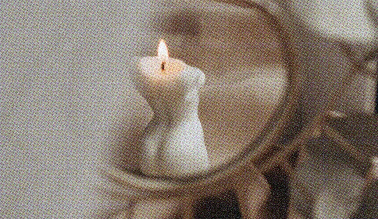 HUD App - Lit candle shaped like womans torso - Fetish 101 wax play 