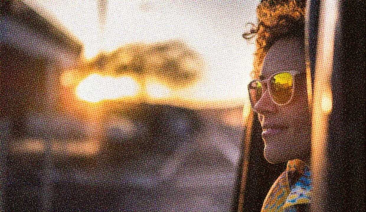 HUD App - Woman wearing sunglasses out of car window - How to reset dating