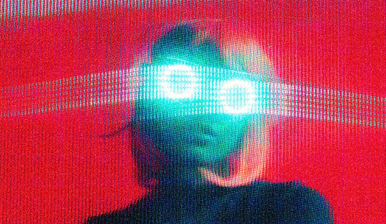 HUD App - Person with glowing eyes - Dating app scams to watch out for
