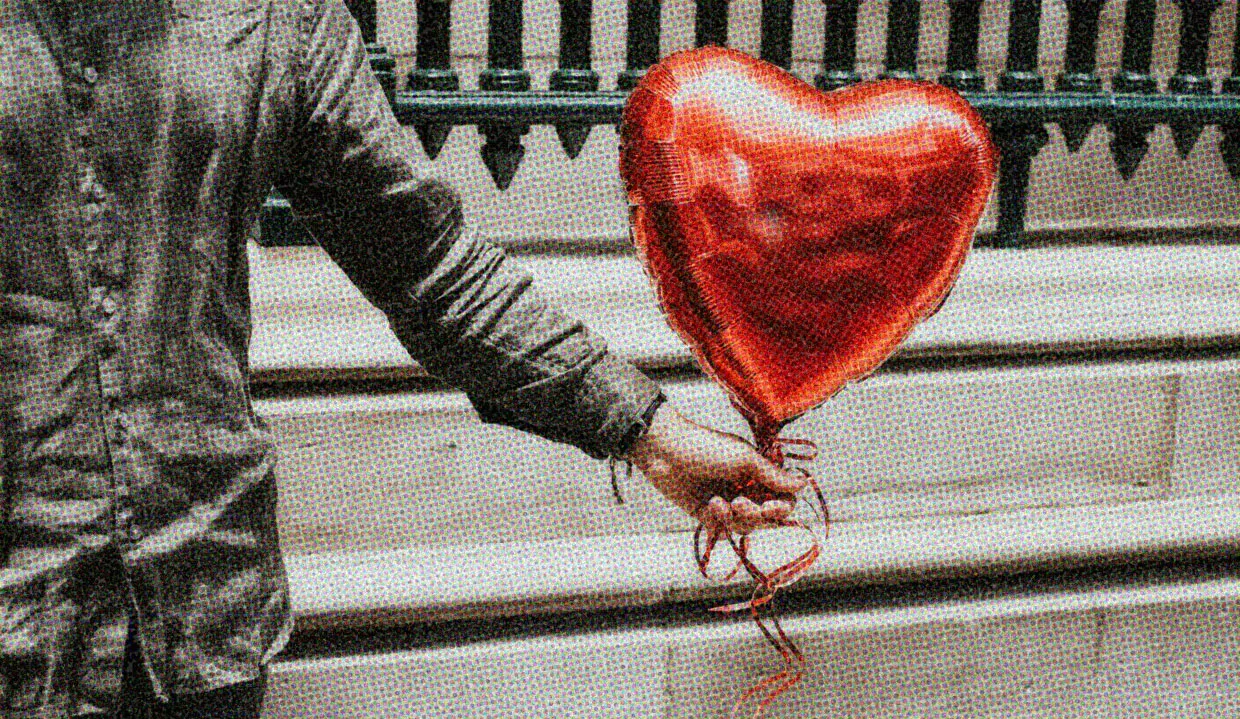 HUD App - Person holding heart shaped balloon - Love Bombing