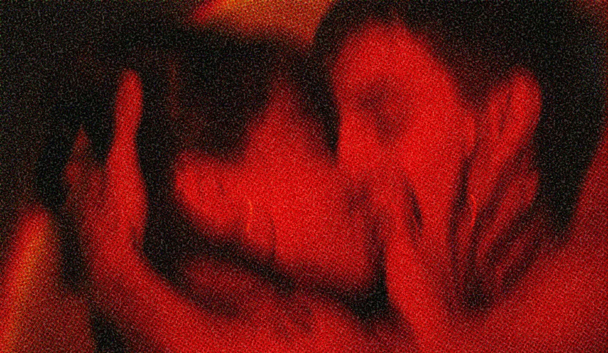 HUD App - Two people kissing in red light - Dating with intention