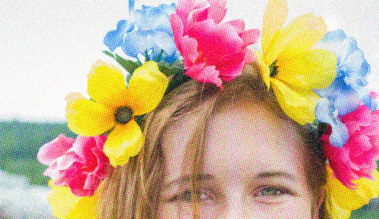 HUD App - Woman wearing flower crown - What does it mean to be Pansexual