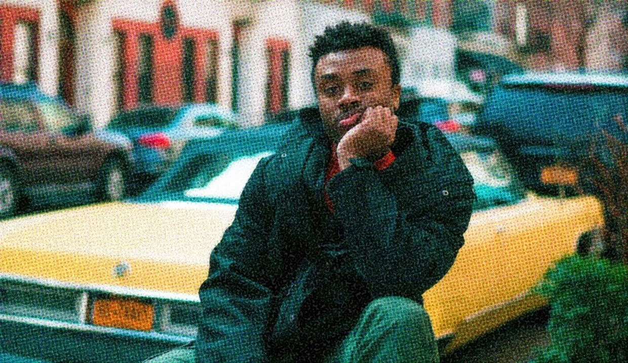 HUD App - Black man posing on yellow car - How to get out of a dating rut