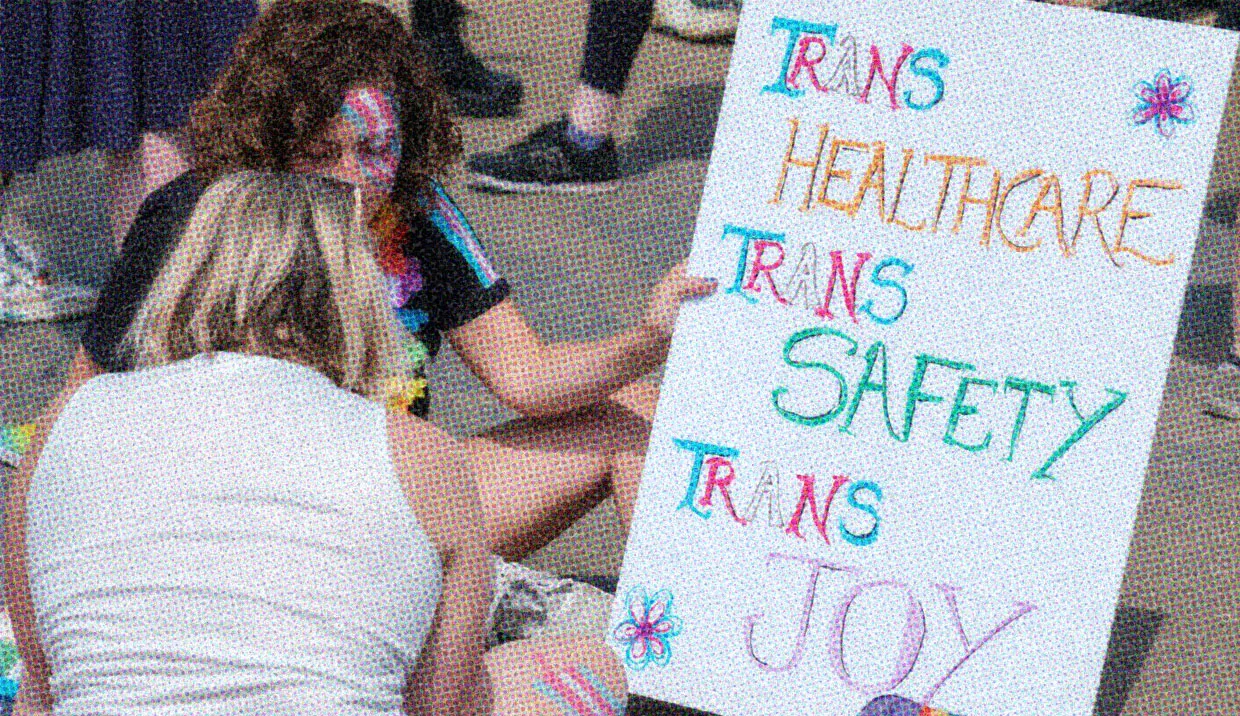 HUD App - Person holding trans rights protest board - How to find an affirming healthcare provider