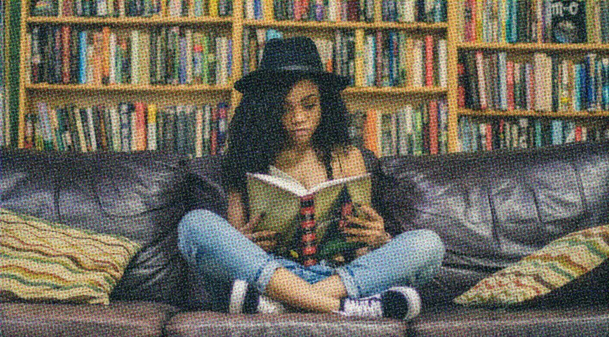 HUD App - Woman reading in library - How to start or join a book club