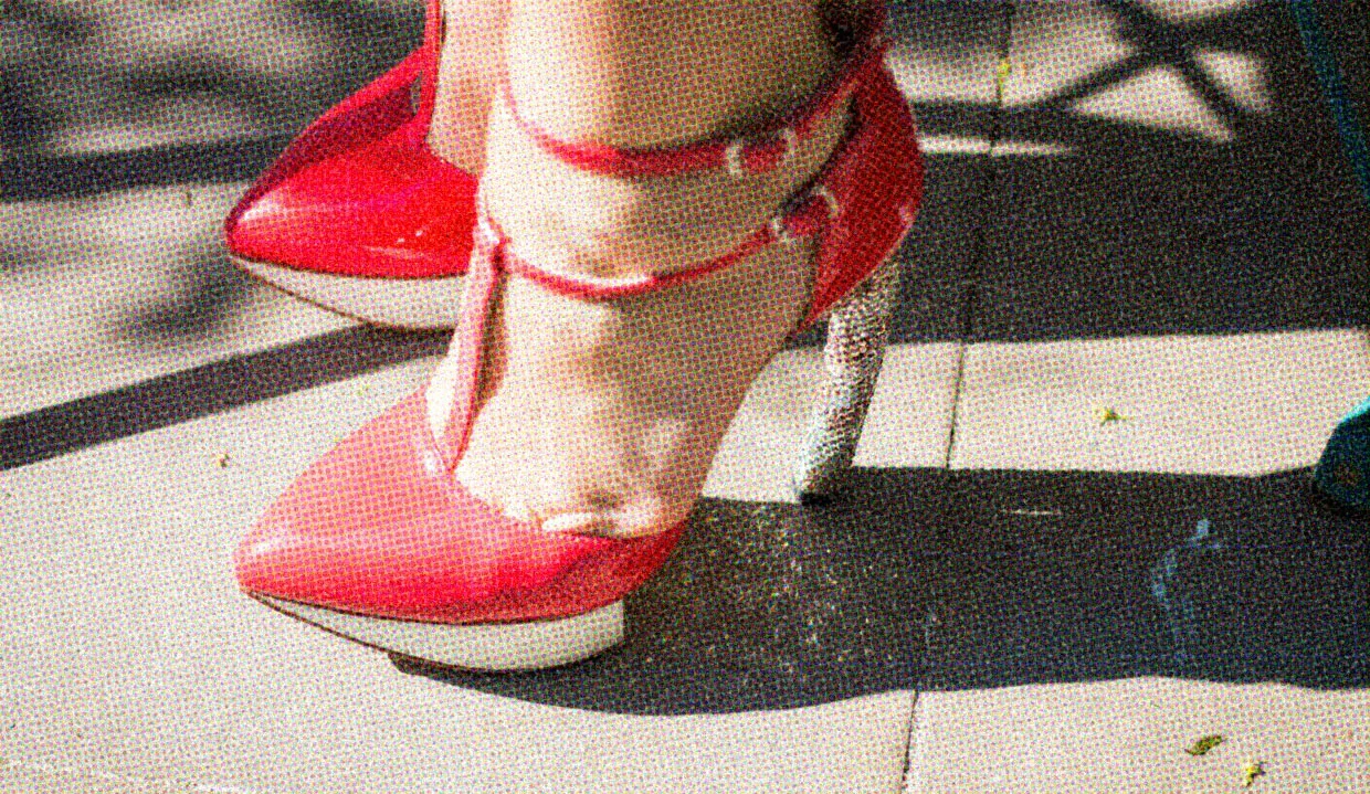 HUD App - Close up of person wearing red high heels - Sex work stigma and violence