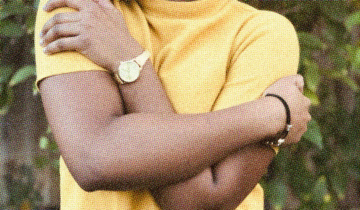 HUD App - Person hugging themselves - self love month