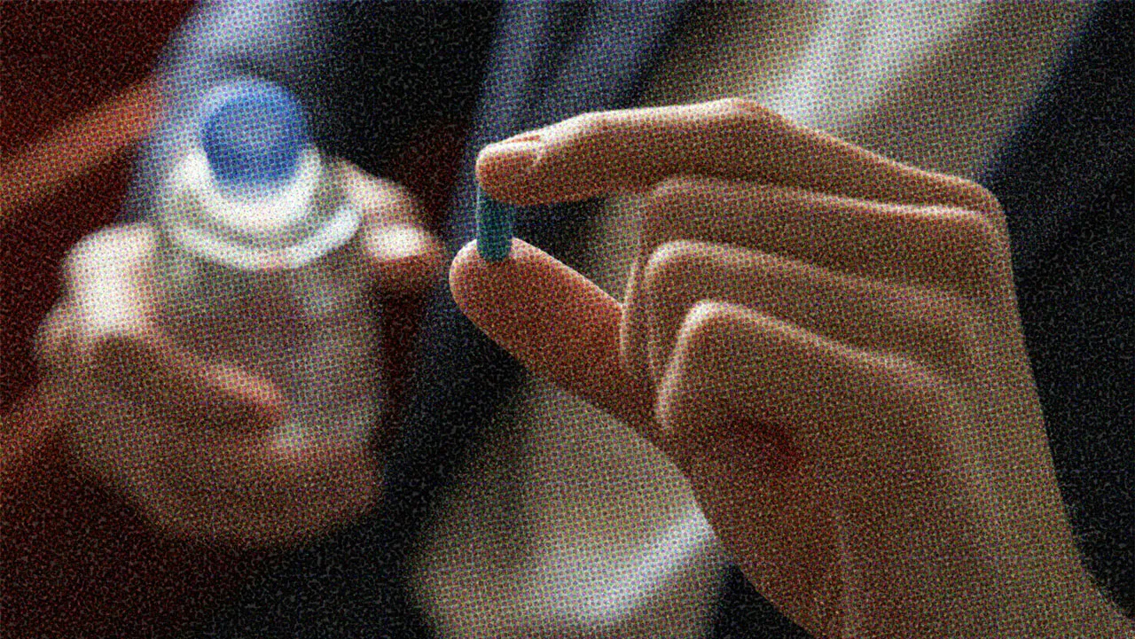 HUD App - Close up of hand holding pill - PrEP and PEP Explained