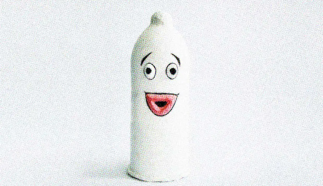 A condom-shaped figure with a silly clown face on a white background. Where is male birth control, and why are we still putting all the responsibility on women?