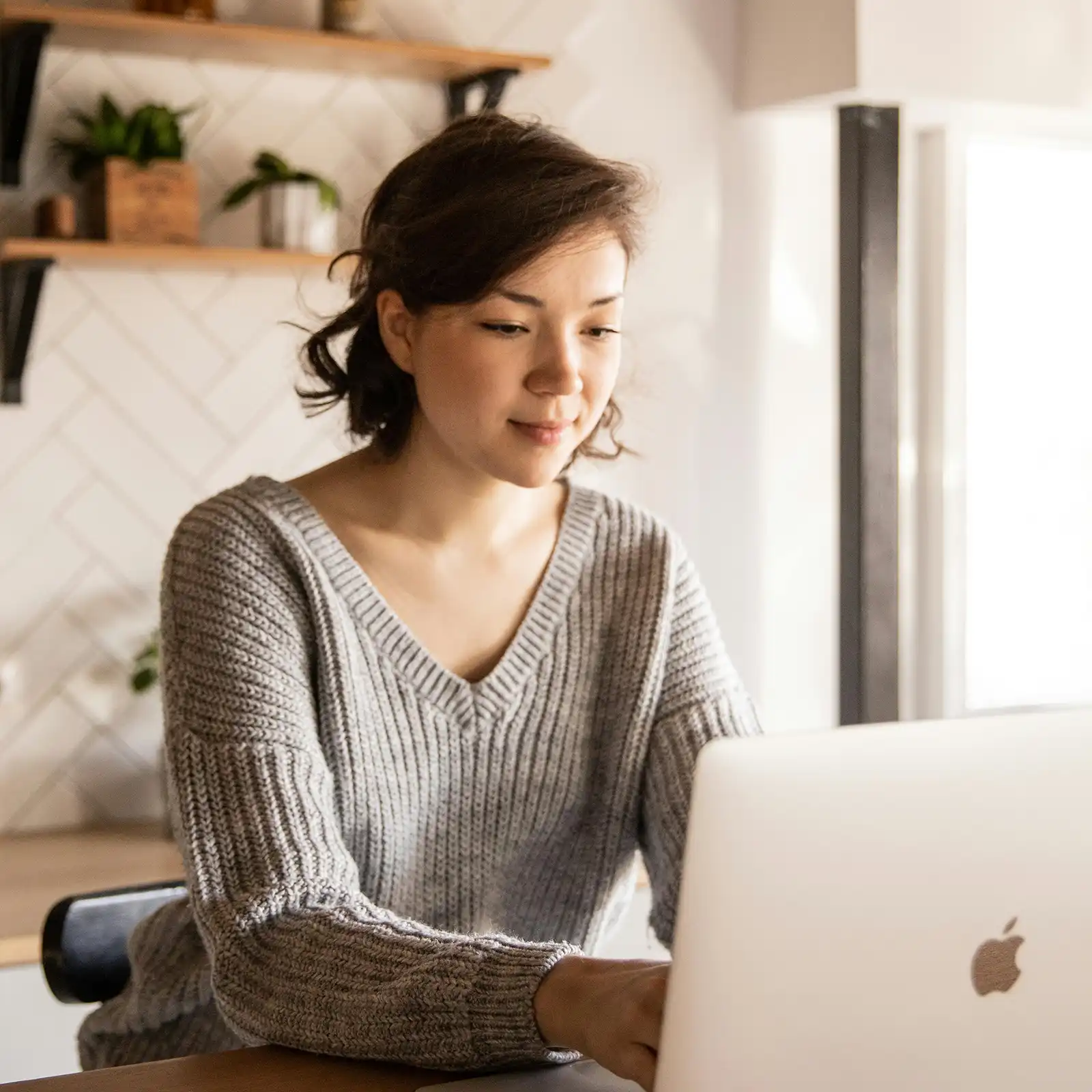 Young mom or school board member participating in an online fundraiser