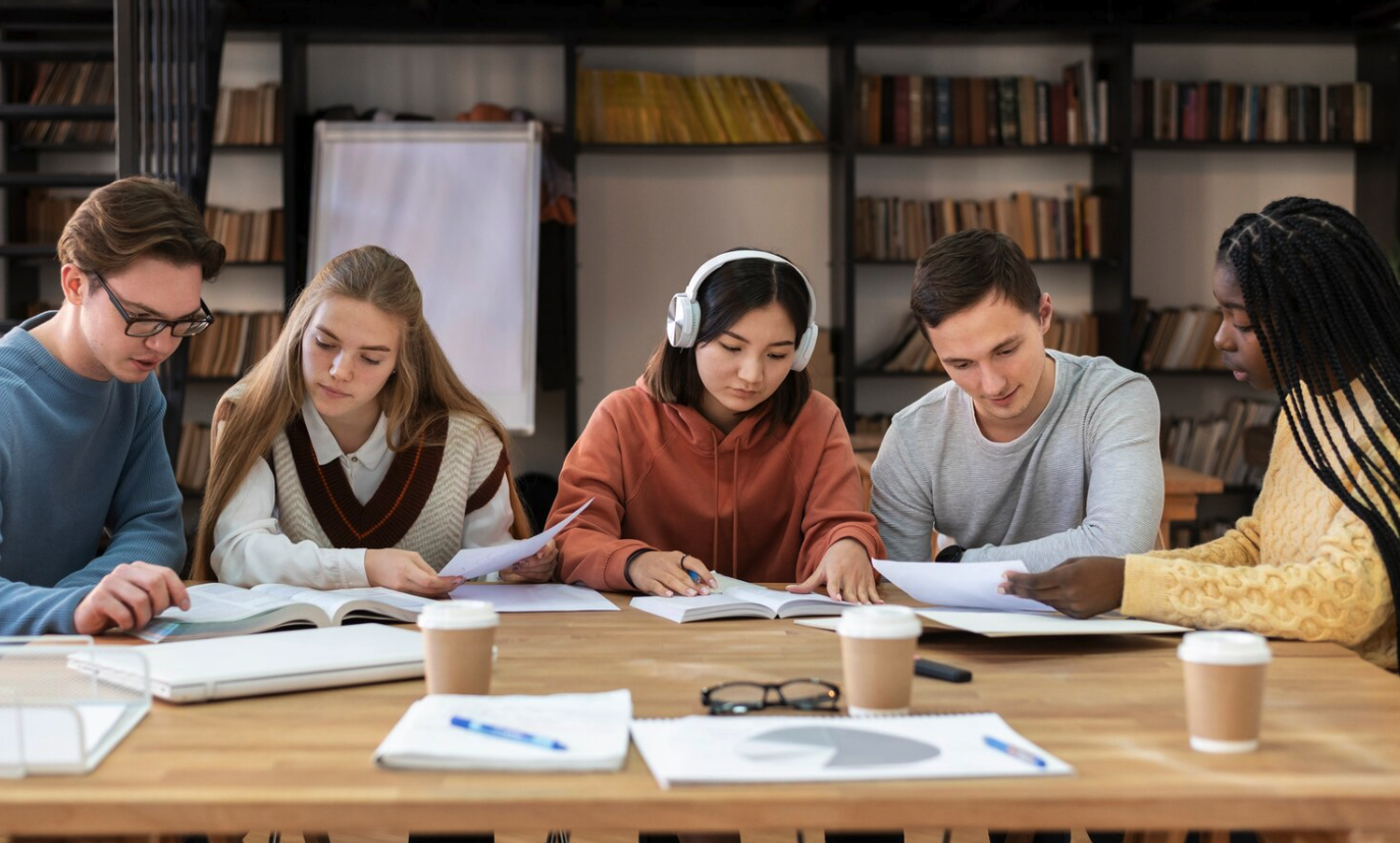 A group of VCE students studying together, reflecting the experience shared in the article about preparing for the VCE English Language exam with the help of a tutor.