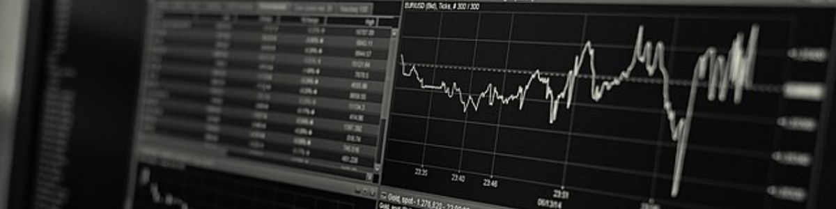 Image decorative showing stock investing charts to convey fundamental vs technical analysis. 