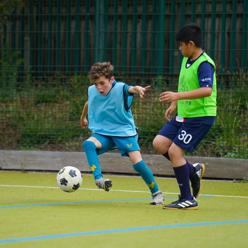 football coach training young football players