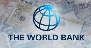The World Bank logo featuring a blue globe above the text overlaid on a background of various international currency notes.