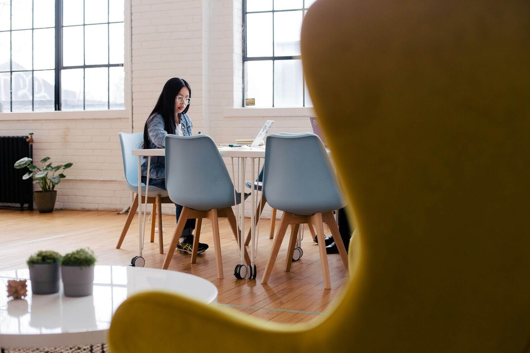 Girl seating watching her computer