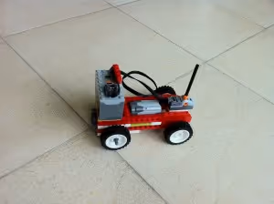 This WeDo car uses an AAA battery pack for power and is turned off and on with a control switch.