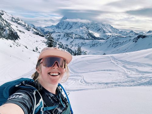 Greta taking a selfie while skiing in the mountains